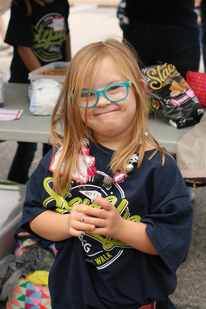 Blonde Girl With Blue Glasses