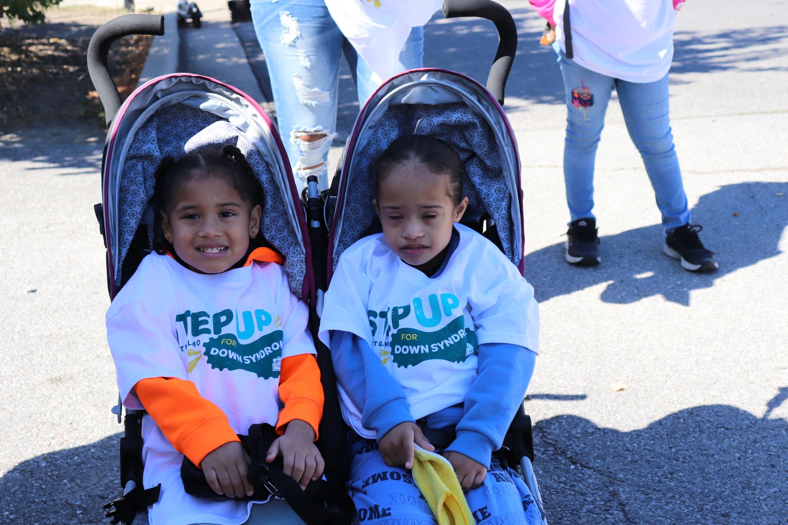 Two Girls In A Stroller
